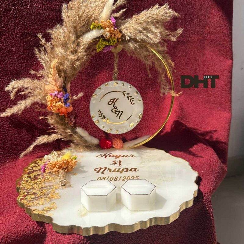 Resin engagement ring platter back with latter logo of couple name