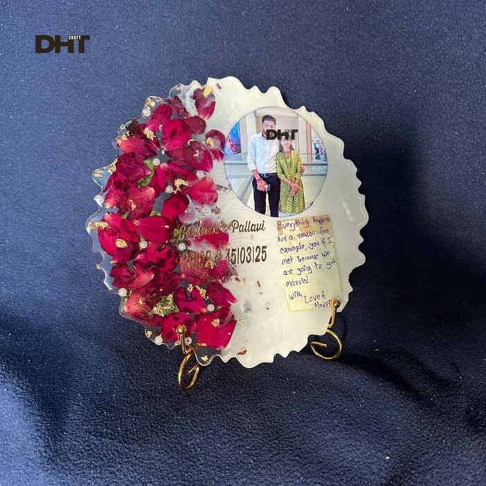 Rose preserved in the photo frame with couple photo