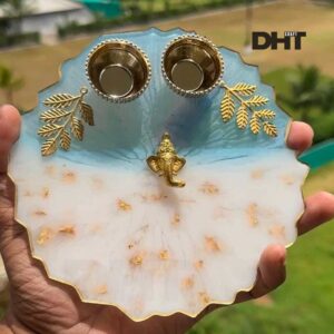 Blue resin plate with Ganeshji idol two katories and golden leaf