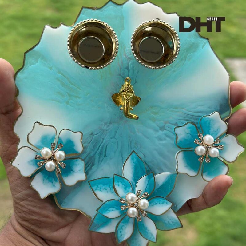 Close up of sky blue pooja thali