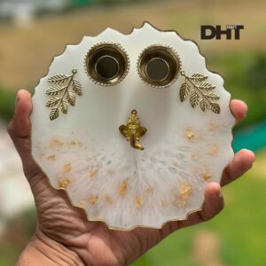White color pooja thali in hand outdoor image