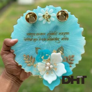 Resin Pooja Plate in hand with green grass background