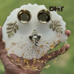 White pooja plate with Golden Leaf in hand