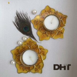 orange colored candle holder